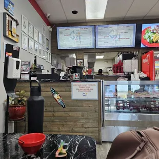 a view of a restaurant counter