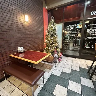 a table and benches in a restaurant
