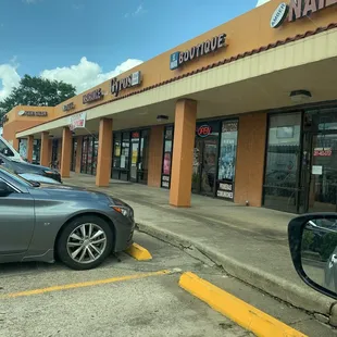 In Strip mall pasted car wash