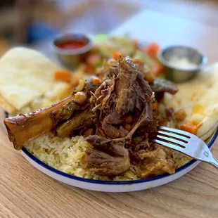 Braised Lamb Shank was fork tender but had no flavor.