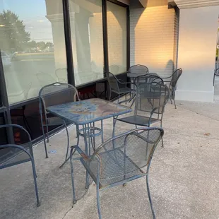 a table and chairs outside