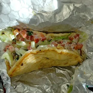 a taco wrapped in foil
