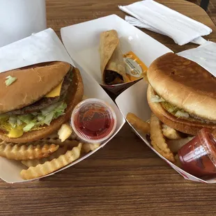 two burgers and fries