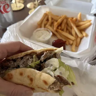 Gyro meal comes with fries and a can of soda