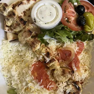 Chicken kabob plate with rice