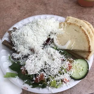 Gyros platter with cheese.