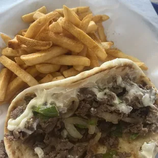 Philly steak wrap and fries.