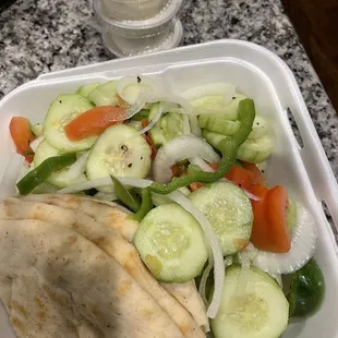 Large cucumber salad with extra taziki sauce !!! N hummus