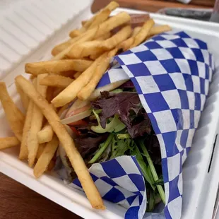 Gyro Sandwich with Lamb &amp; Beef Gyro, Lettuce, Tomatoes, Onions, Tzatziki Sauce, Pita Bread, and French Fries