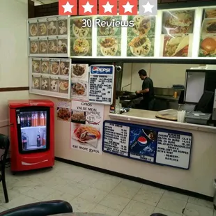 The cook at Gyro Palace doing his thang!