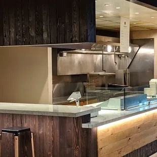 a view of a restaurant counter