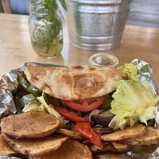 Falafel and veggie gyro with greek potatoes