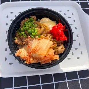Gyudon beef rice bowl with kimchi and egg which made