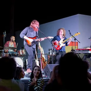 a band playing on stage