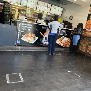 a man standing in front of a counter