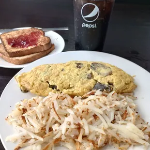 Mushroom and Swiss Omelet,Hash Browns, Wheat Toast, Diet Pepsi