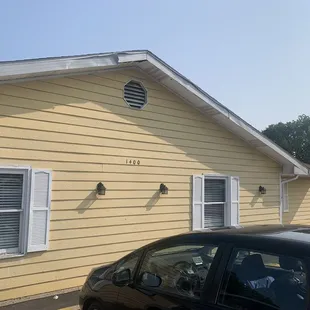 a car parked in front of a house