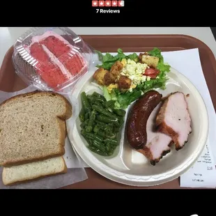 Smoked turkey breast &amp; sausage, green beans, side salad, homemade bread &amp; homemade strawberry cake.