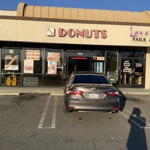 a car parked in front of the store