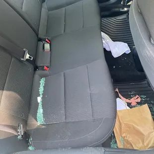 The glass was not vacuumed by kia. Although the personal objects were removed prior to dropping the car off