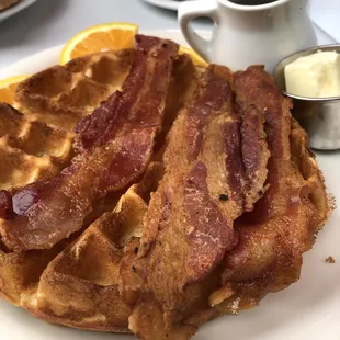 Waffle with bacon, sub with real maple syrup! The waffle was delicious too!