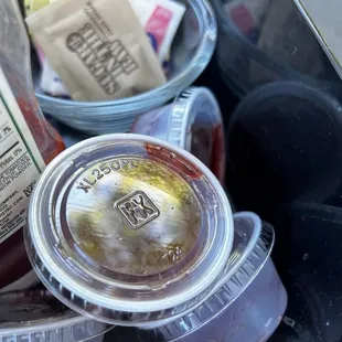 Unlabeled containers of jelly.