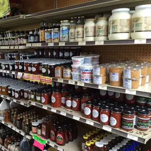 shelves full of jars of condiments