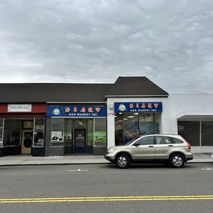 a car parked in front of the store