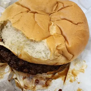 Jucey burger served fresh. Note it was hot so the bun stuck to the wrapper.