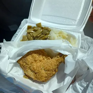 Fried chicken leg 1/4, green beans, cabbage, and my potatoes in a separate bowl.