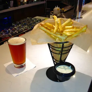 Our guest favorite! I dare you not to try our famous Rosemary Garlic Parmesan Fries. The perfect bar snack to pair with our 10 Local Drafts!