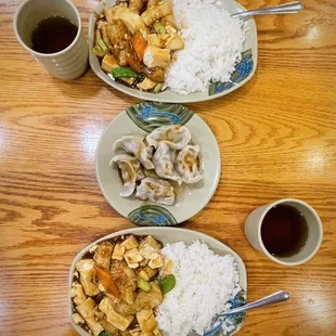 Flounder with soft tofu over rice and a side dish of dumplings  pork &amp; chives. Delicious.