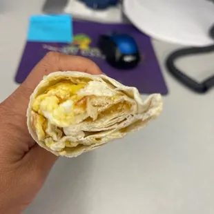 Supposed to be bacon, egg, potatoes breakfast burrito