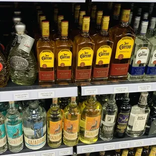 a variety of liquor bottles in a store