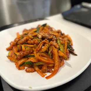 a plate of stir fried vegetables
