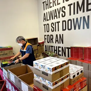 They're giving away free goody bags to customers. It's a black tote with dishwashing gloves and disposable gloves