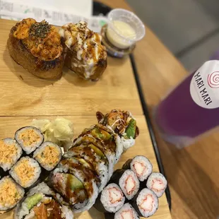 Spicy crab and salmon teriyaki Inari  Spicy tuna roll, fried crab roll, shrimp tempura roll