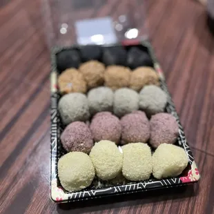 a tray of chocolates on a table