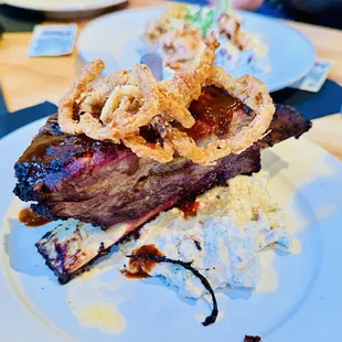 Long Rib with potato salad &amp; crispy fried onions appetizer