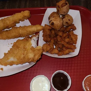 Chicken, fish, clams and puppies.