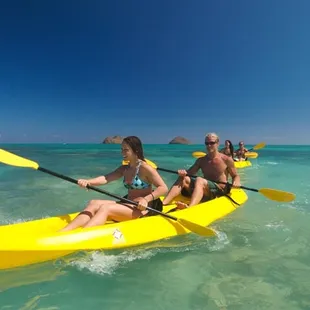 Kayak to a remote island in Kailua beach, go snorkeling &amp; try to catch a wave back to shore!