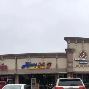 cars parked in front of a building