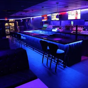 a bar with neon lights
