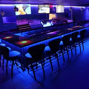 a bar with neon lights