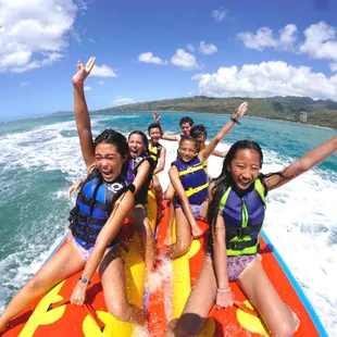 Hang loose and hold tight! Banana Boating causes smiling.