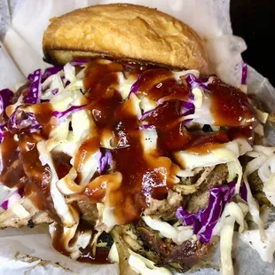 Pig face sandwich - pulled pork, creamy slaw, bat outta hell sauce.