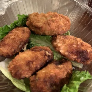 Deep Fried Oysters that were overcooked and slightly burnt on several