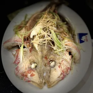 a plate of food with fish