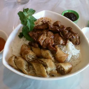 vermicelli with bbq pork and spring rolls