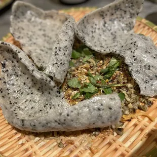 Baby clams with crispy rice crackers